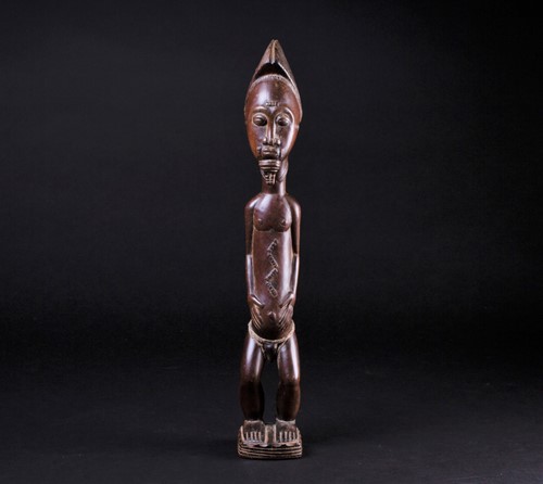 Lot 3 - A Baule Blolo Bian standing figure, Ivory...