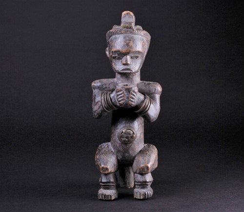 Lot 48 - A Fang Byeri figure, Gabon, with long coiffure,...