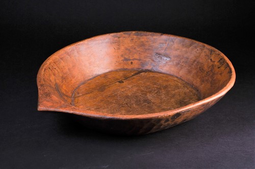 Lot 28 - An Indian carved wood bowl, the rim...