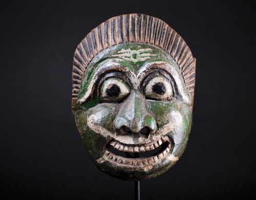Lot 30 - An Indonesian carved and painted wood mask,...