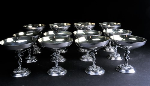 Lot 424 - A set of eight Lambidis silver-plated coupes,...