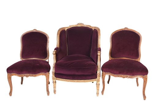 Lot 105 - A French carved, gilded and upholstered...