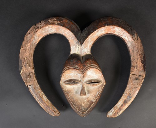 Lot 40 - A Kwele mask, Gabon, the mask with narrow eye...