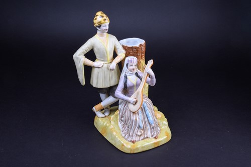 Lot 404 - A Russian Gardner porcelain figure group, a...