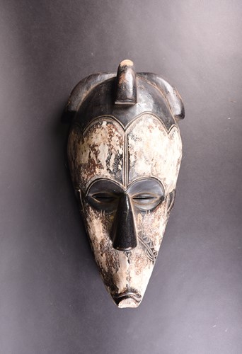 Lot 142 - A Fang mask, Gabon, the face with incised...