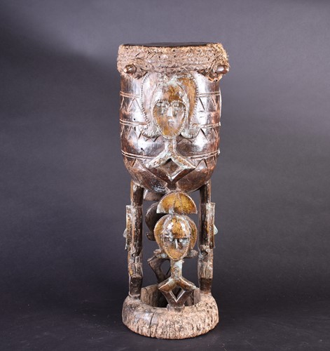 Lot 127 - A Kota funerary drum, Gabon, relief carved in...