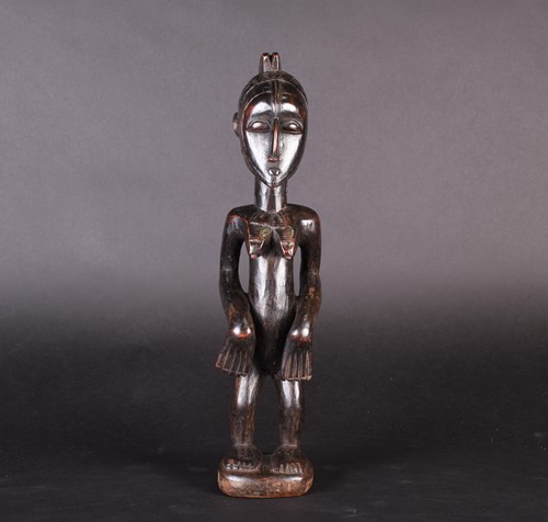 Lot 115 - A Baule standing female figure, Blolo Bla,...