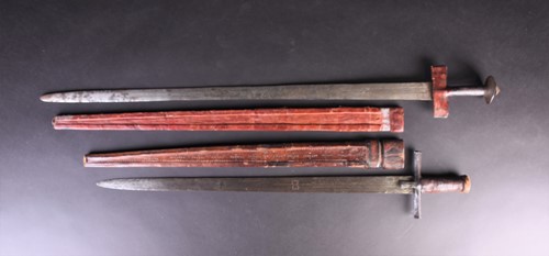 Lot 77 - Two Sudanese Tuareg Takouba swords, the...
