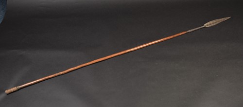 Lot 112 - An African long spear, the leaf shaped blade...