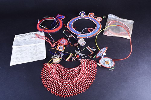 Lot 133 - A small collection of South African glass bead...