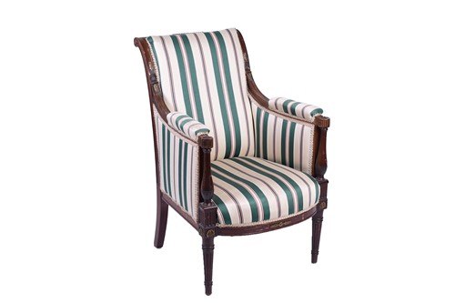 Lot 112 - A French Empire style armchair, the mahogany...
