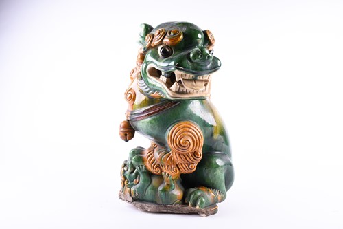 Lot 160 - A large Chinese sancai glaze temple lion, Qing,...
