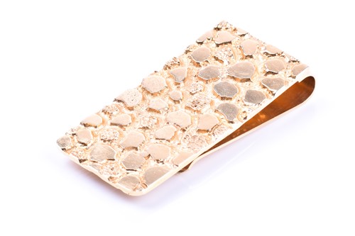 Lot 602 - A 14k yellow gold money clip, with textured...