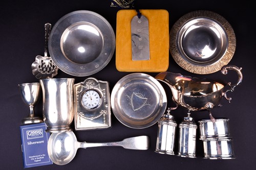 Lot 553 - A collection of mixed silver and white metal...