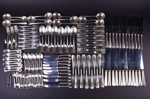 Lot 554 - A large harlequin suite of silver flatware,...