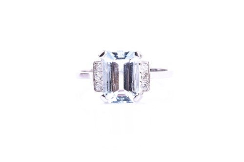 Lot 606 - A platinum, diamond, and aquamarine ring, set...