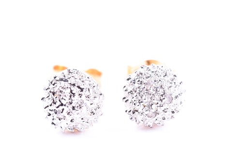 Lot 614 - A pair of 18ct white gold and diamond accent...
