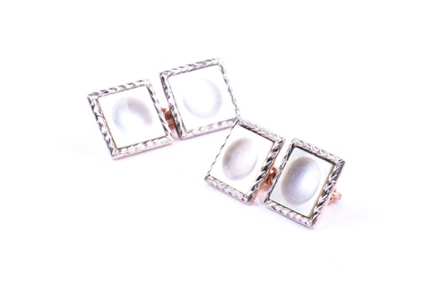 Lot 627 - A pair of 9ct rose gold and mother-of-pearl...