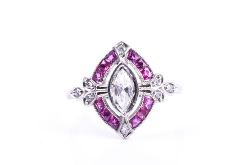 Lot 632 - A diamond and ruby ring, set with a...