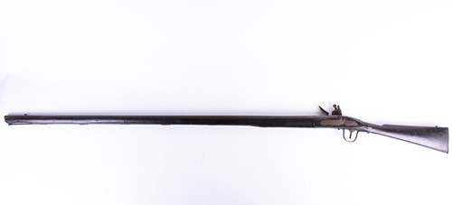 Lot 440 - An Indian flintlock long rifle, late 18th...