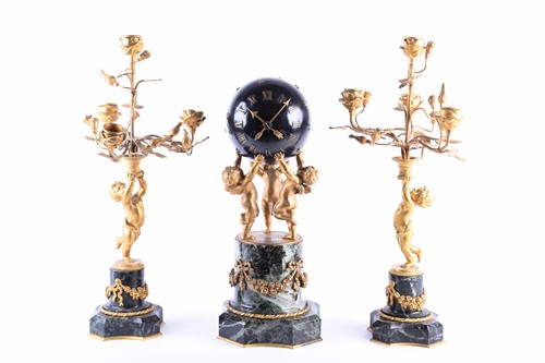 Lot 529 - A French gilt metal and marble clock garniture,...