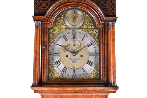 Lot 530 - A Georgian walnut long case clock, the arched...