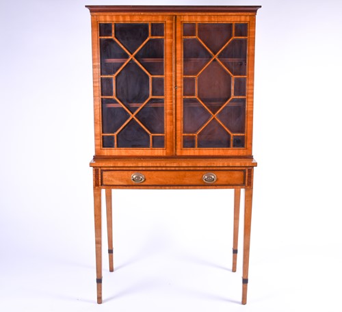 Lot 123 - A Georgian style satinwood display cabinet on...