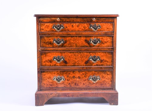 Lot 130 - A Georgian style small chest, oyster veneer,...