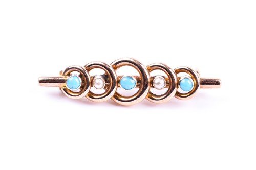 Lot 649 - An early 20th century yellow metal, turquoise,...