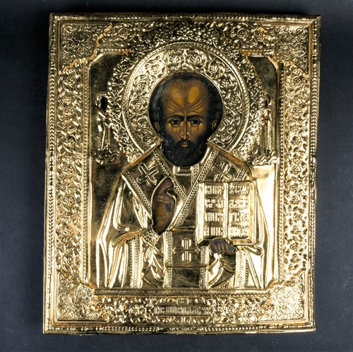 Lot 380 - A 19th century painted Russian icon on wood,...