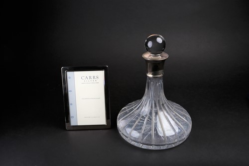 Lot 564 - A late 20th century glass decanter with silver...