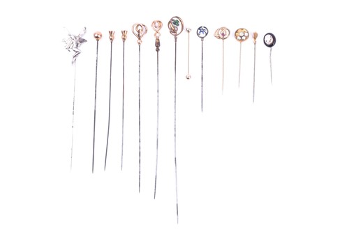 Lot 651 - A group of yellow metal Victorian hat pins,...