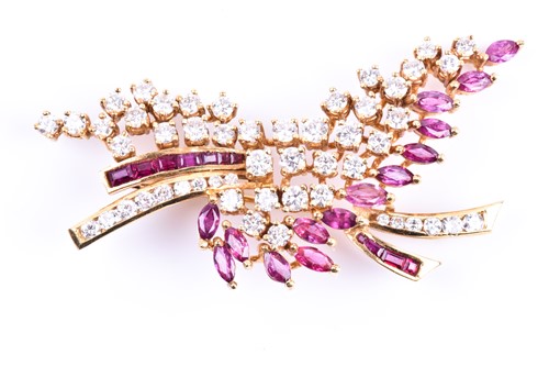 Lot 652 - A diamond and ruby spray brooch, set with...
