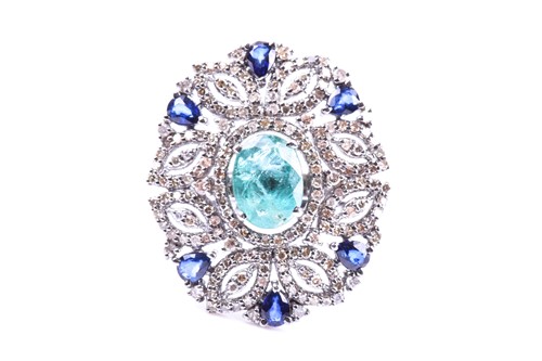 Lot 663 - An impressive diamond and emerald cocktail...