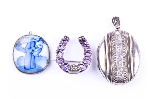 Lot 667 - A Victorian silver locket, the case with...