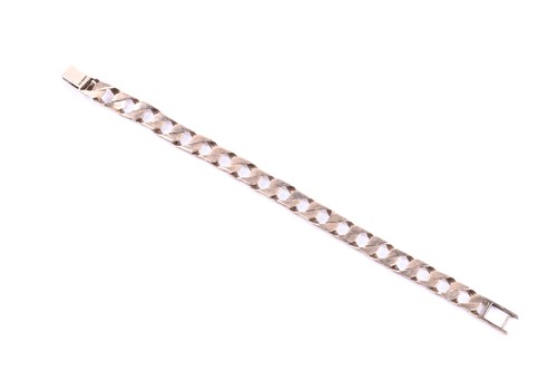 Lot 675 - A 9ct yellow gold textured curb-link bracelet,...