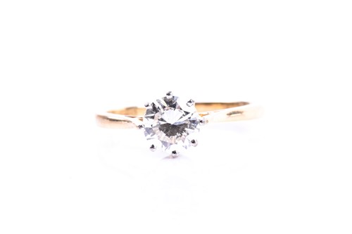 Lot 679 - An 18ct yellow gold and solitaire diamond ring,...