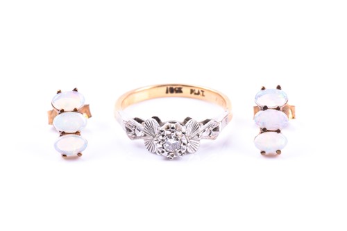 Lot 680 - An 18ct yellow gold and diamond ring, the...