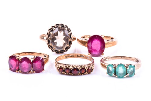 Lot 681 - A 9ct yellow gold and emerald ring, together...