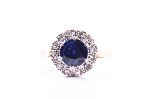 Lot 692 - An 18ct yellow gold, diamond, and sapphire...