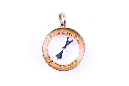 Lot 714 - A novelty 15ct yellow gold miniature compass...