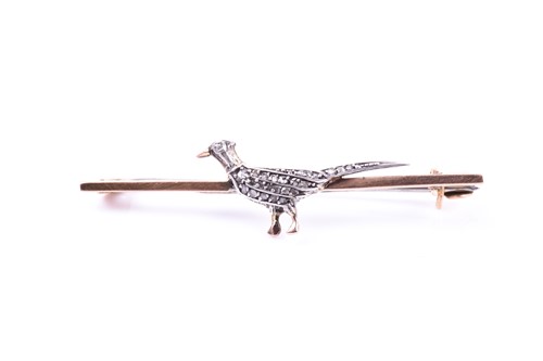 Lot 723 - A 9ct yellow gold and diamond pheasant brooch,...