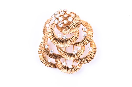 Lot 725 - Kutchinsky. A yellow gold and diamond brooch,...