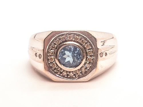 Lot 754 - A 9ct white gold, diamond, and topaz gents...
