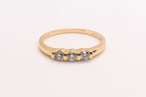 Lot 761 - A 14ct yellow gold and diamond ring, bar-set...