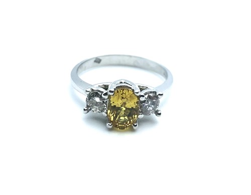 Lot 771 - An 18ct white gold, diamond, and yellow...