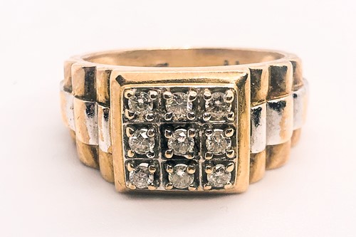 Lot 772 - A 9ct yellow gold and diamond gents ring, in...