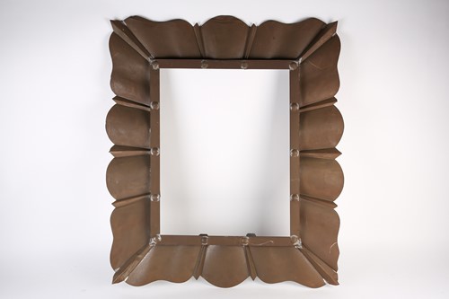 Lot 457 - An Art Deco period copper mirror frame, traces...