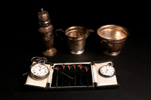 Lot 543 - A set of eight silver cocktail sticks, the...