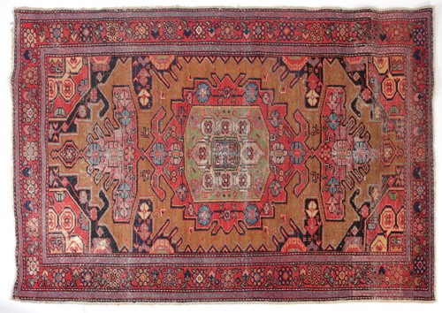 Lot 277 - An old Serab rug with a geometric lozenge...